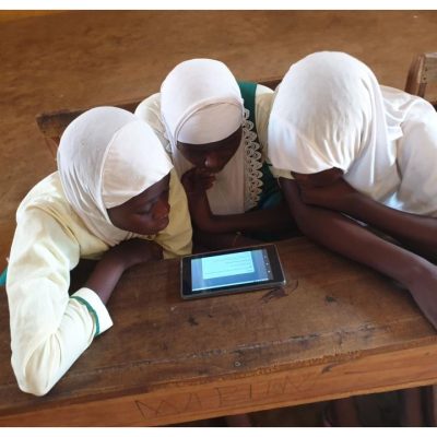 Girls reading on a tablet